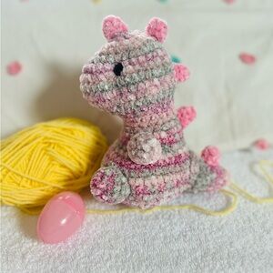 Pink and Gray Crocheted Dinosaur Stuffed Animal
